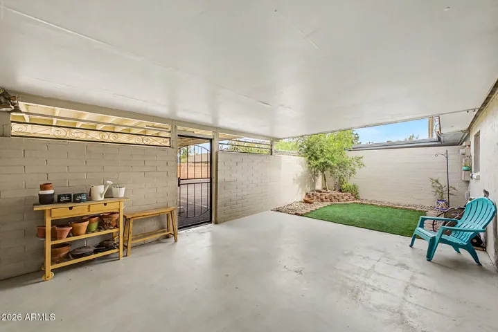 large covered patio with turf!