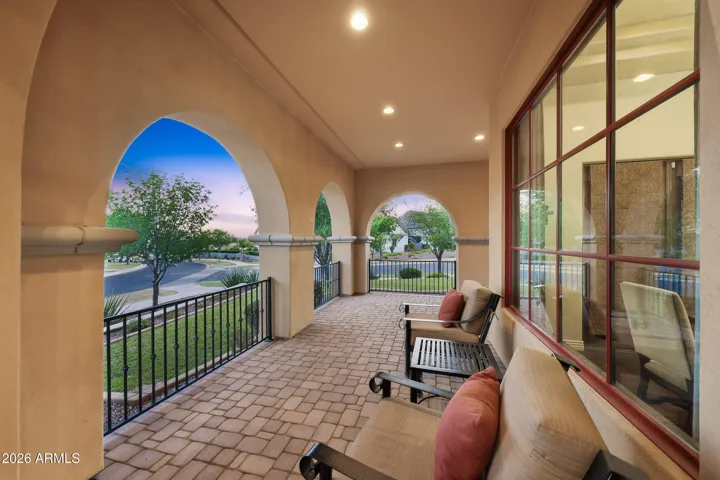 Inviting front porch with charming architectural details.