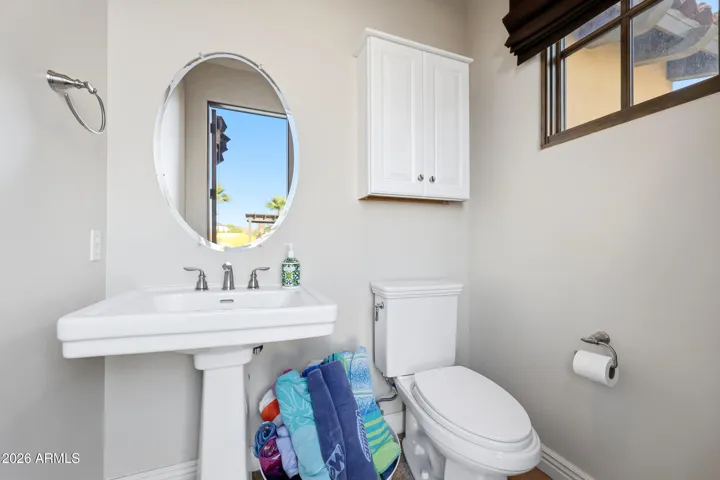 Dedicated outdoor pool restroom adds convenience for guests and outdoor entertaining.