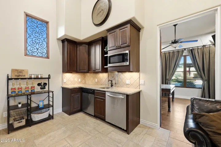 Casita kitchenette includes a microwave, refrigerator, and dishwasher for added convenience.