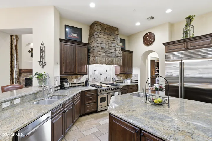Rich wood kitchen cabinetry offering timeless style and abundant storage space.