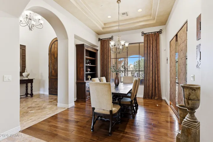 Formal dining room with direct access to the front porch for seamless indoor outdoor.