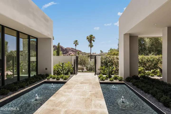 Privately Gated Front Courtyard + Mountain Views
