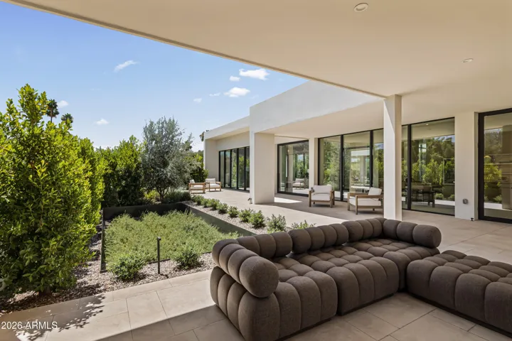 Covered Patio with Gas Fireplace + Built-In BBQ