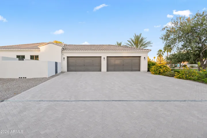 4-Car Garage with ample slab parking
