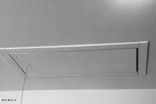Garage pull-down ladder