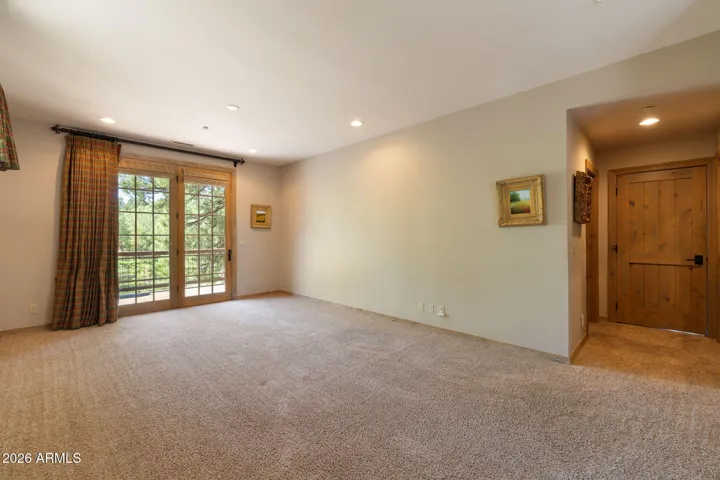 primary on the main floor with views of the golf course