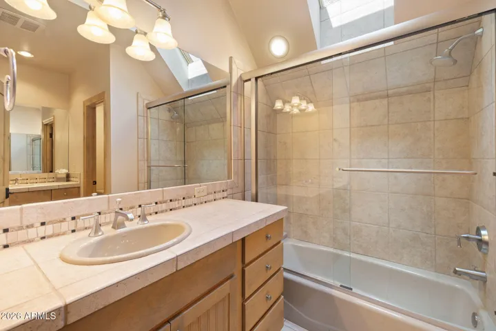 3rd bedroom bathroom with dual sinks