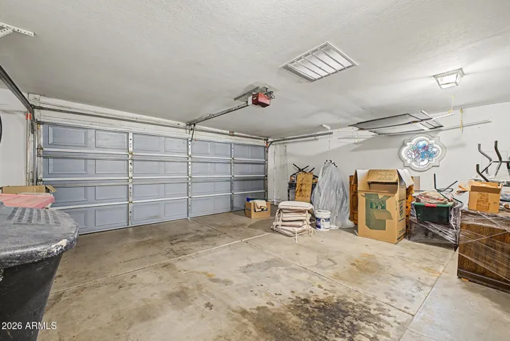 2 Car Garage with Storage Cabinets
