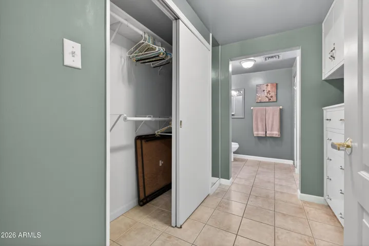 Spacious closet with double hung rods for maximum storage