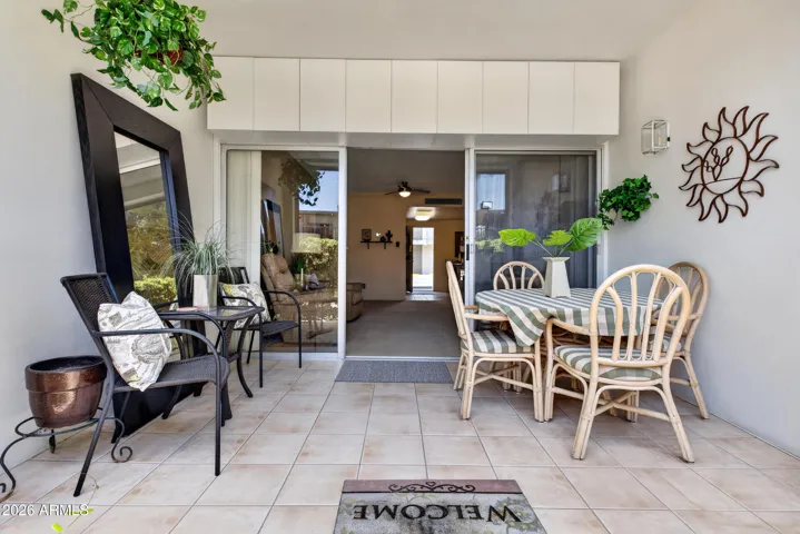 Covered patio is ideal for outdoor resort living at home.