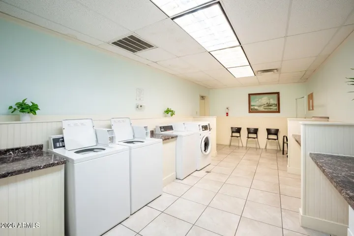 You can also put a small stackable washer/dryer inside your unit.