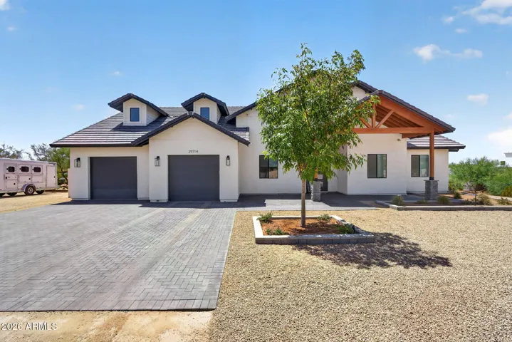 Front of home. Over sized 2 car gargage
