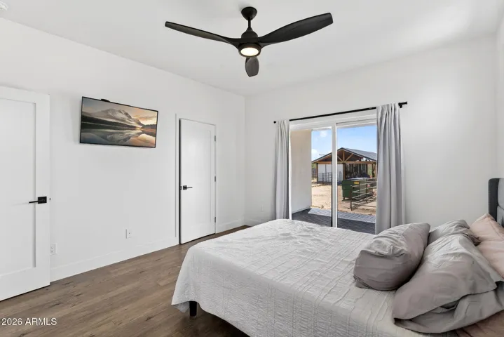 Guest casita bedroom with view of barn