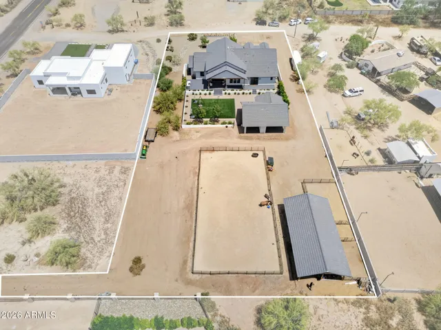 Aerial footprint 1.15 acres east facing. Plenty of room to pull trailer thru from 63RD ST out onto Dixileta