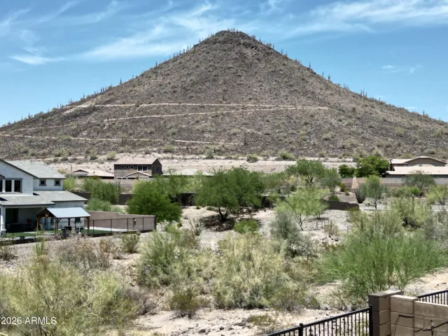 Capturing the true essence of Arizona living, this view highlights the majestic mountains positioned directly to the rear of the property. Enjoy stunning, unobstructed desert vistas.