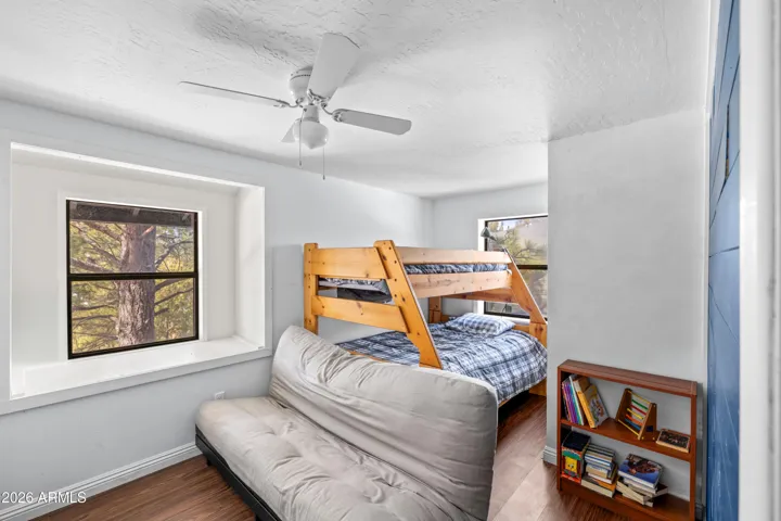 Comfortable guest room with natural light.