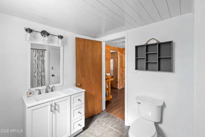 Spacious bathroom with modern touches and natural light.