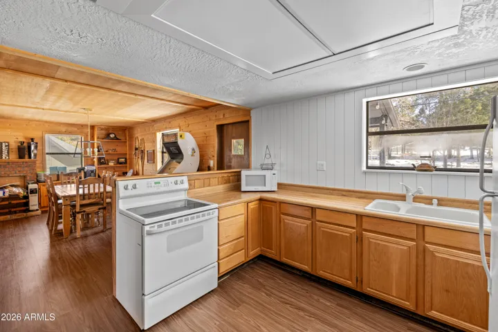 Warm, open kitchen with rustic mountain charm
