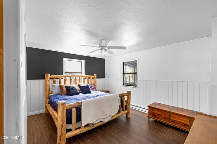 Comfortable bedroom retreat with natural light.