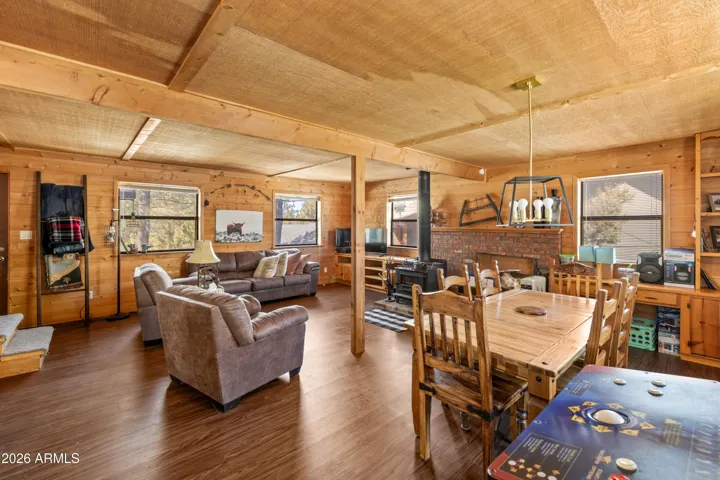 Cozy open living space with beautiful wood ceilings