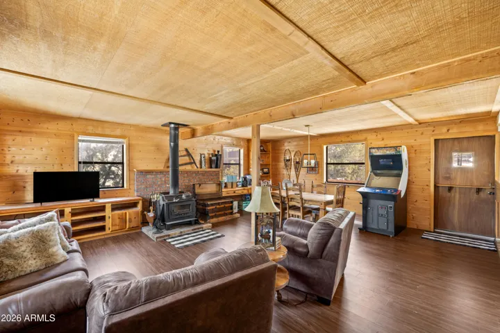 Spacious living area with warm wood accents.