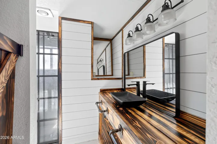 Stylish double vanity with modern farmhouse touches.