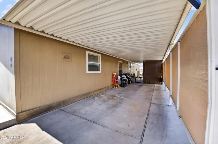 Carport that fits 2 cars and a golf cart!