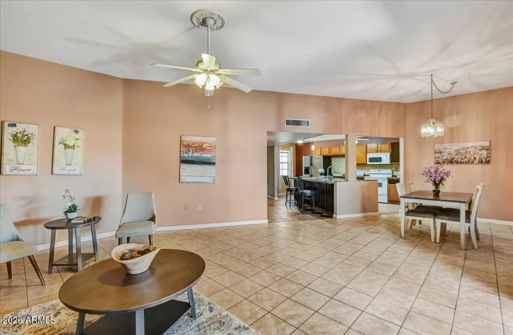 Broad view of the expansive main living area, emphasizing the home's open feel, high ceilings, and bright, welcoming atmosphere.