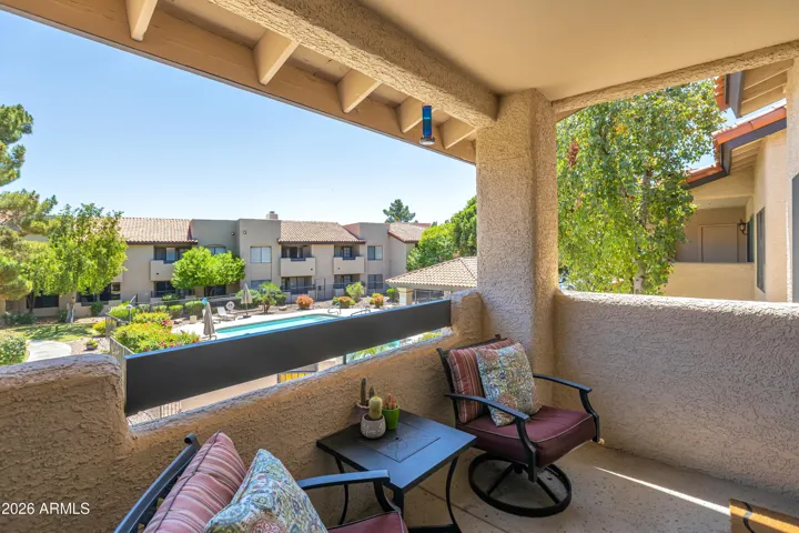 Step out large patio with view of the heated pool and spa!