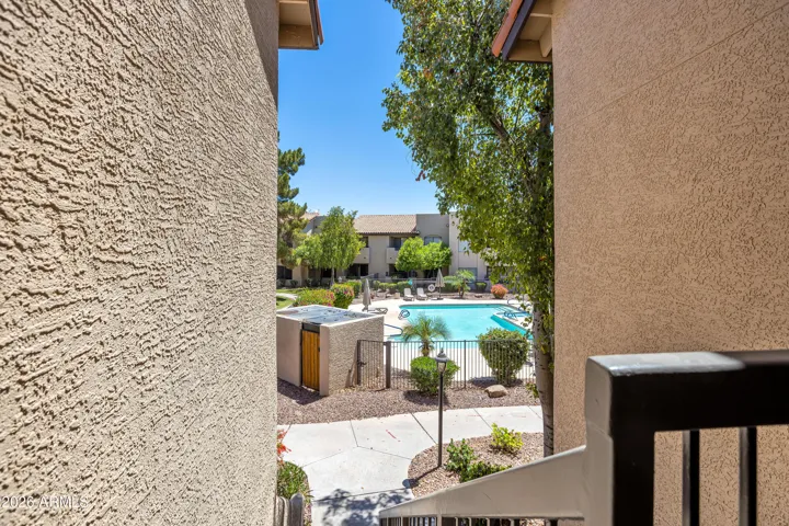 Out your front door, down the steps and you are at your paradise pool area!