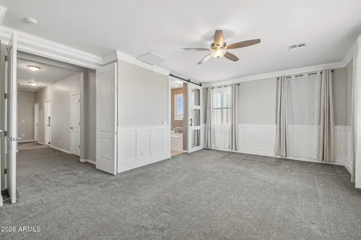 Spacious Primary Bedroom with barn door
