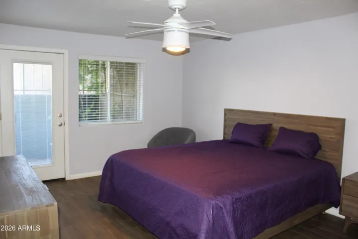 Primary Bedroom with Doors to Private Patio
