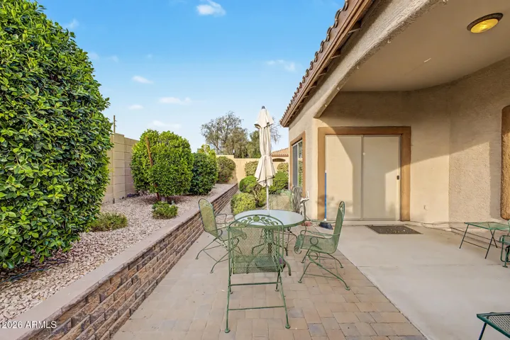 Low maintenance yard with beautiful shrubs.
