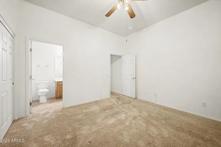 Bedroom #3 with door into hall bathroom
