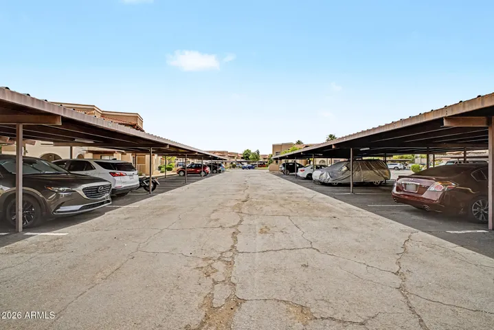 Unit has 1 covered parking space (60) but there is ample uncovered guest spots