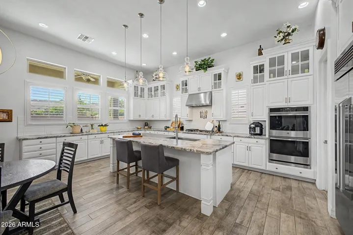 Large open kitchen w/ custom cabinets