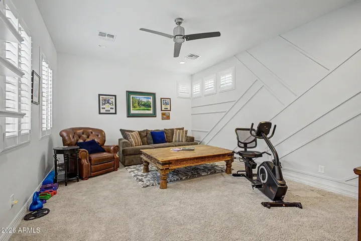 Large bonus game room w/ accent wall