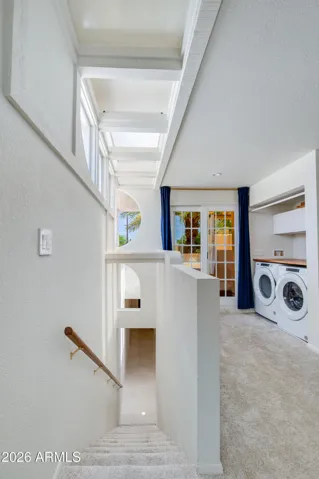 Looking downstairs from the top of the stairs in the upstairs bedroom.