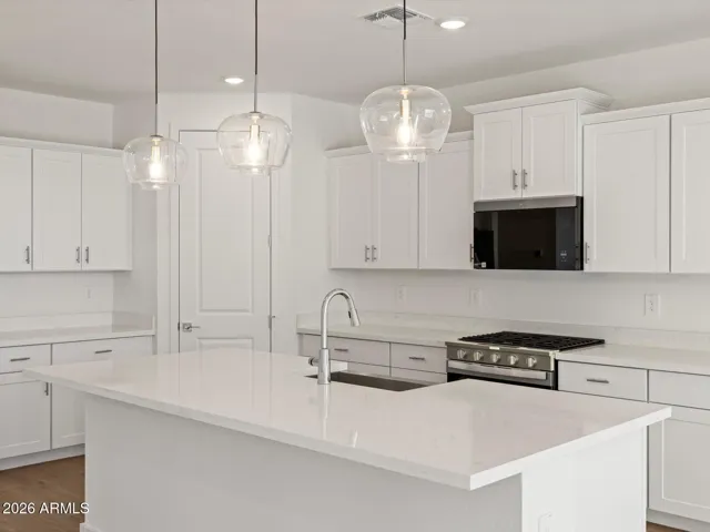 Photo is not of the actual home. Interior finishes and fixtures may vary.