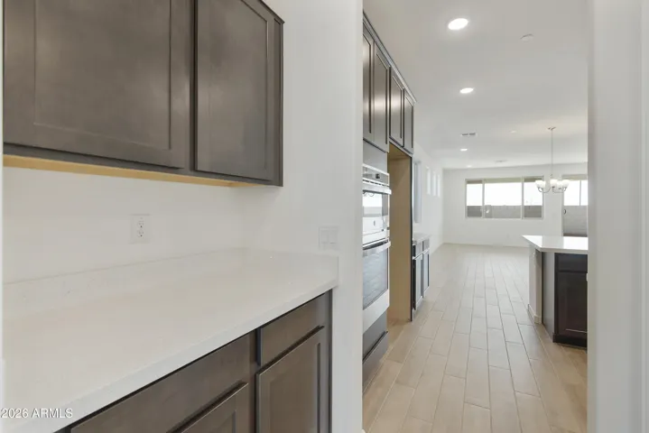 BUTLER'S PANTRY FOR EXTRA STORAGE.