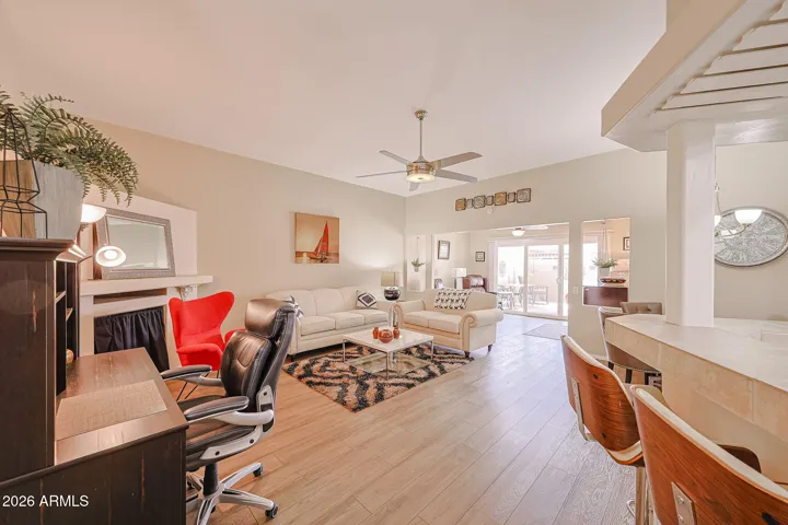 great room with a view toward the bonus room and patio