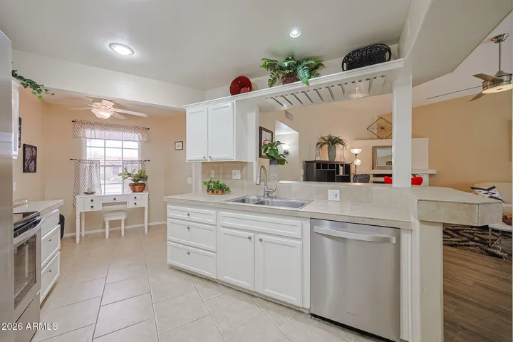 updated cabinetry includes drawers for pots and pans