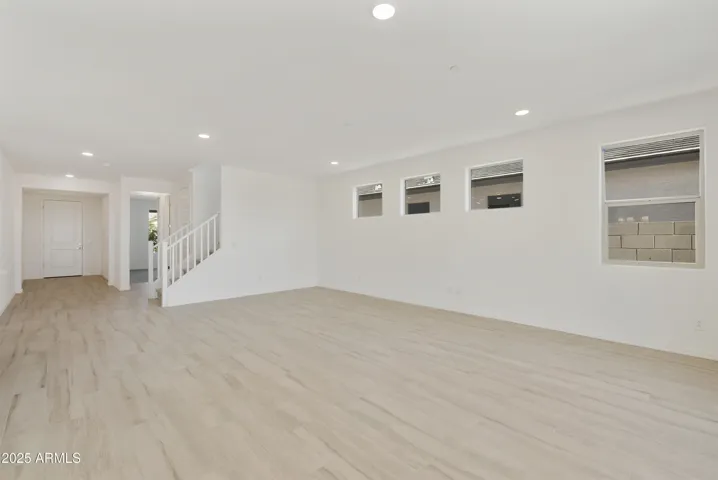 ALL TILE THROUGHOUT THE BOTTOM LEVEL EXCEPT FOR THE GUEST SUITE!