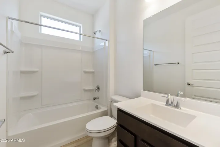 BOTTOM LEVEL GUEST SUITE AND FULL BATH!