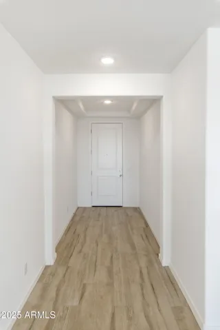 ALL TILE THROUGHOUT THE BOTTOM LEVEL EXCEPT FOR THE GUEST SUITE!