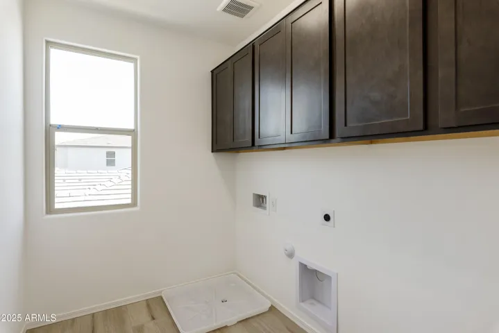 LARGE LAUNDRY ROOM WITH CABINETS!