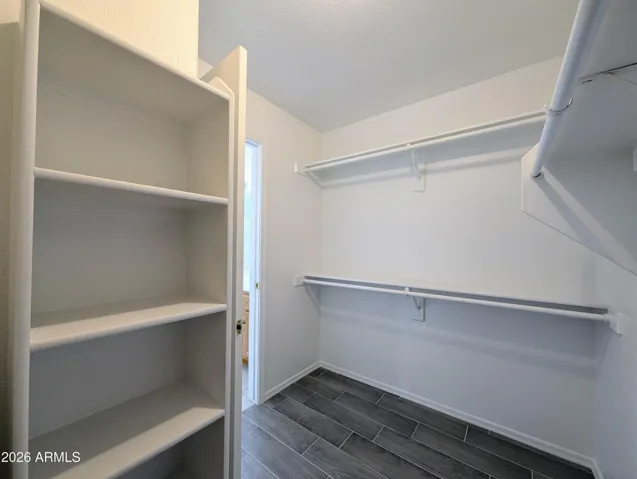 MASTER CLOSET WITH SHELVING.