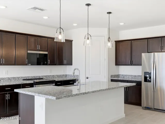 Photo is not of the actual home. Interior finishes and fixtures may vary.