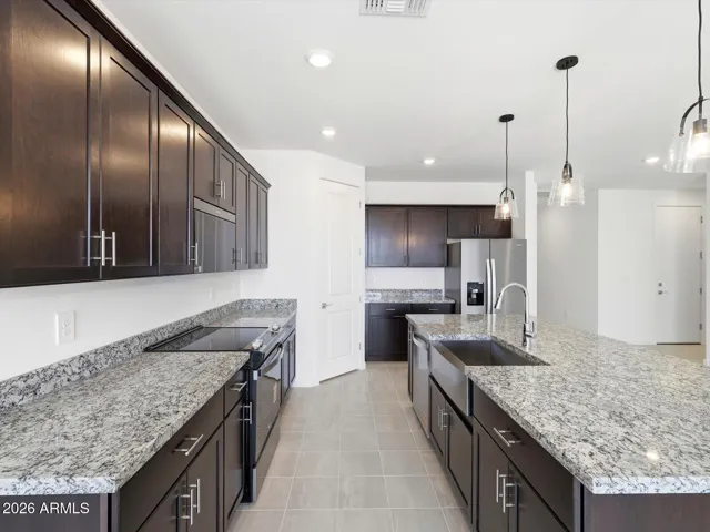 Photo is not of the actual home. Interior finishes and fixtures may vary.